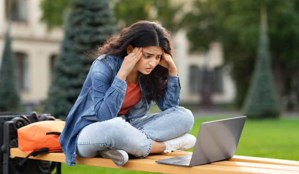 young girl looking burned out at school