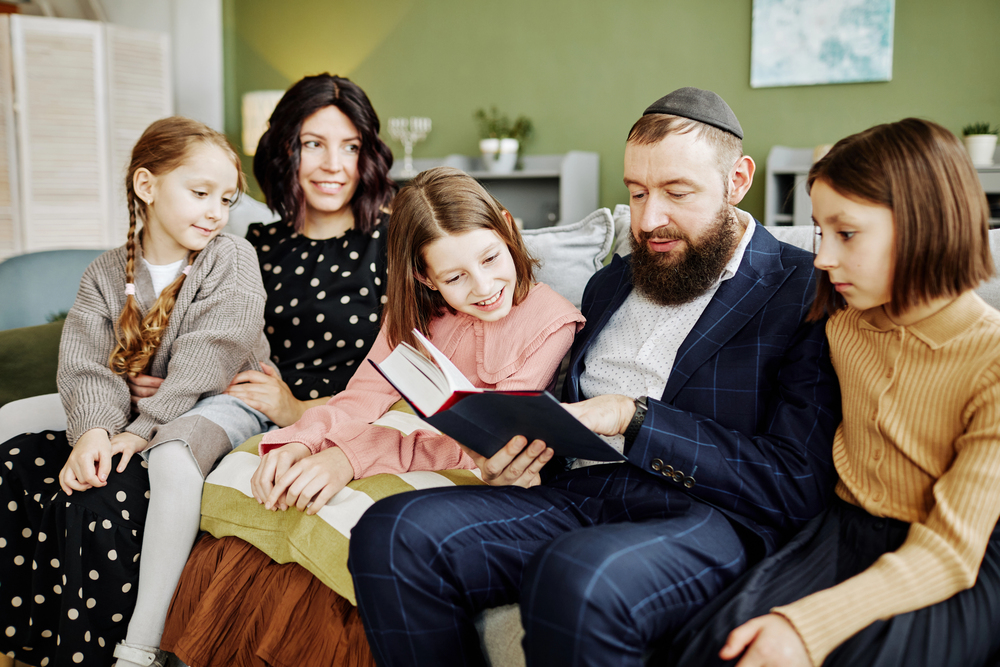 Jewish family reading in their living room - Hero image for Jewish rehab